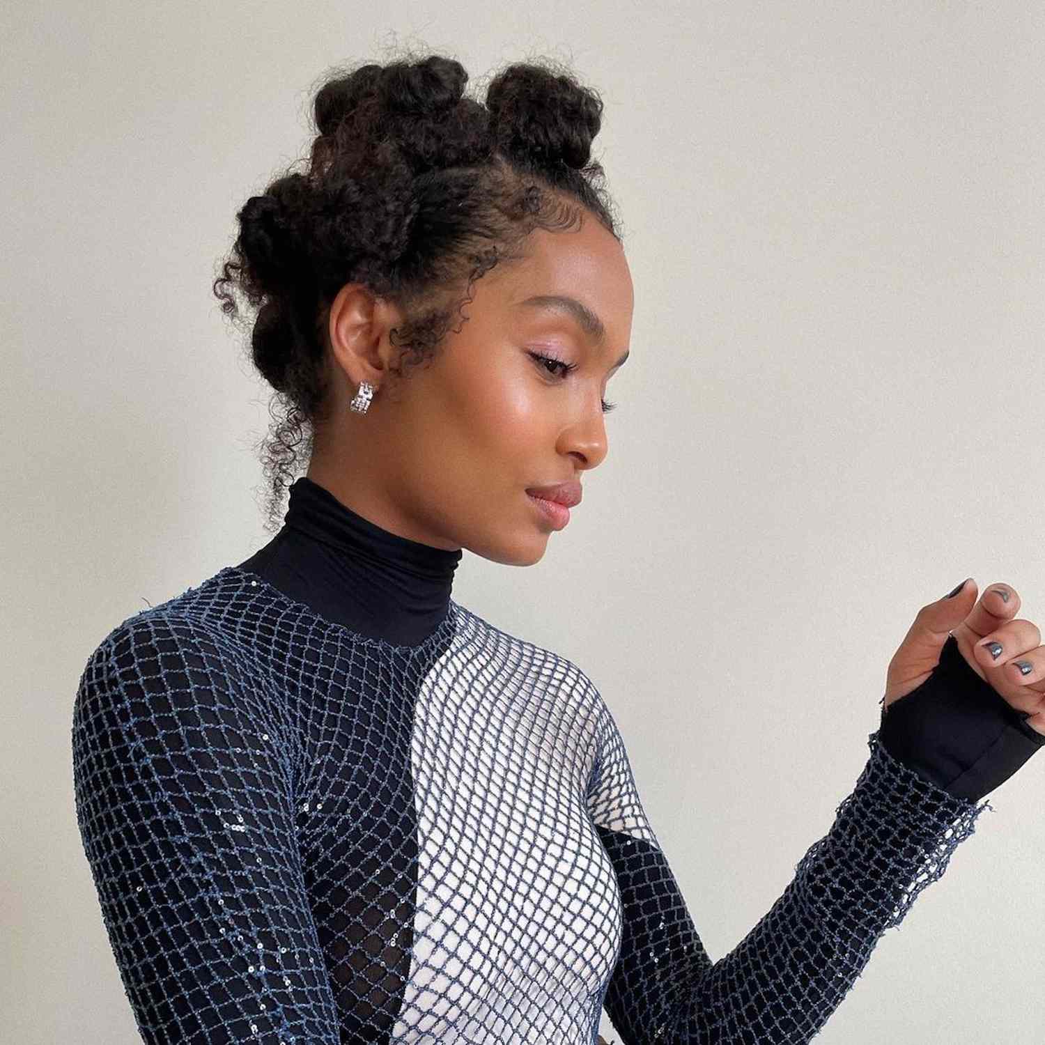 Yara Shahidi wears multiple buns