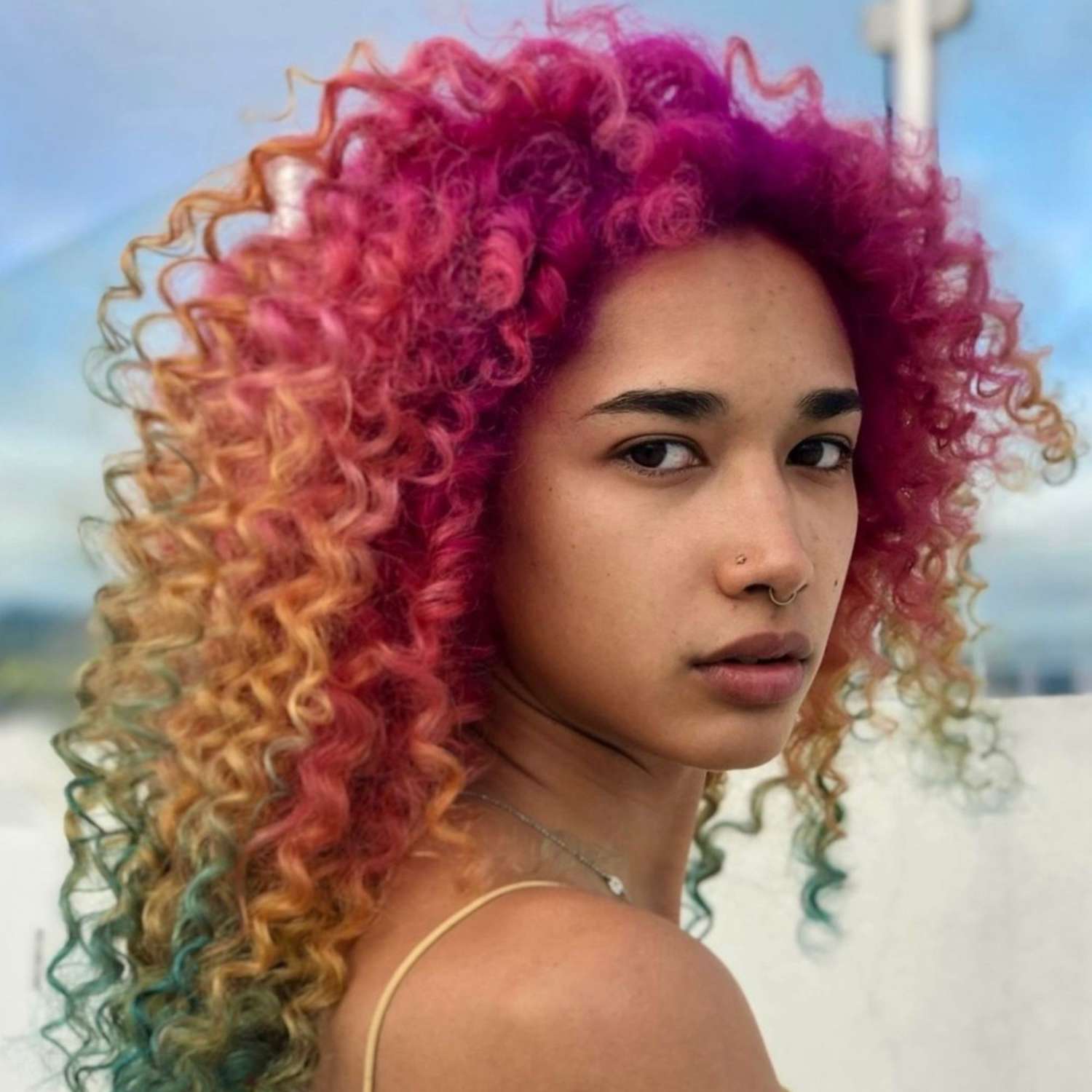 Rainbow-colored curls.