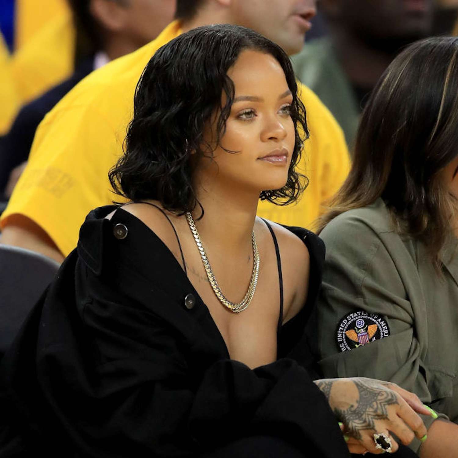 Rihanna with short curly hair