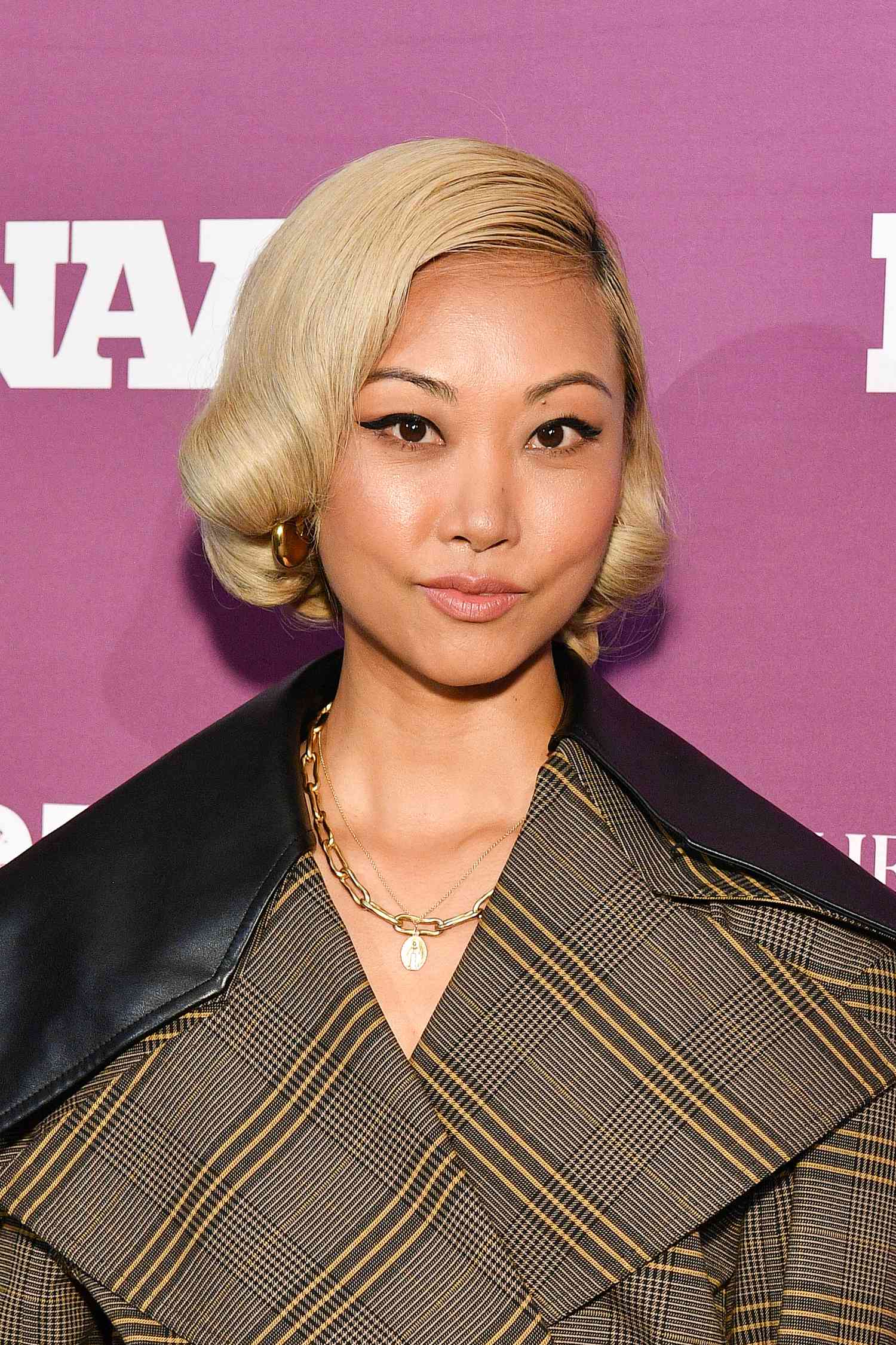 Vanessa Hong with Beige Blonde hair.